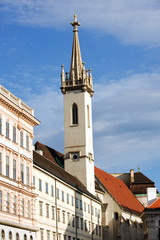 Fototapeta na wymiar Gothic church in Vienna by the Opera theater, Austria