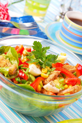 fresh salad with breaded meat and vegetables