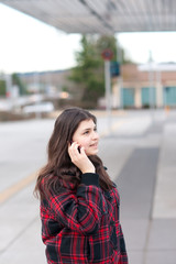 Young girl talking on her cell phone