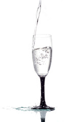 Water is poured into a glass