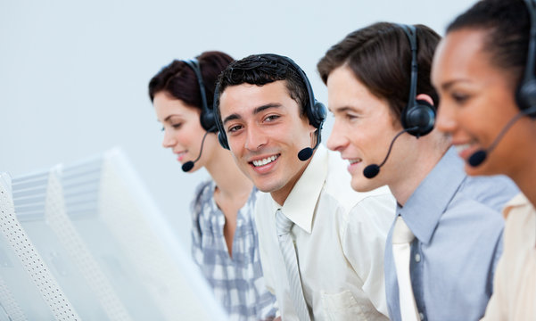 Young customer service representatives in a call center