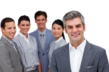 Fototapeta premium Smiling manager standing with his team