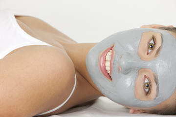portrait of woman with facial mask