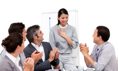 Victorious businesswoman applauded for her presentation