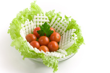 Vegetables salad in a glass salad bowl