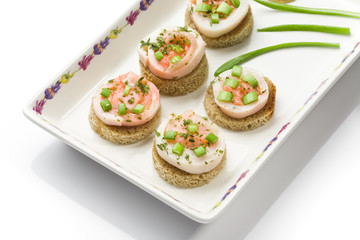 Seafood canapes  on a square dish