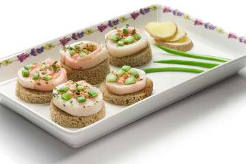 Seafood canapes  on a square dish