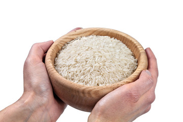 Hands holding bowl of rice