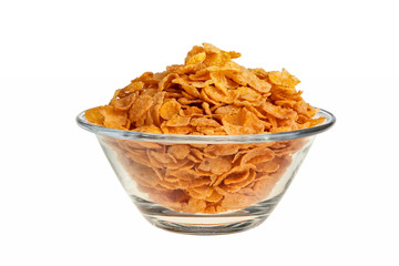Cornflakes in glass bowl isolated over white background.