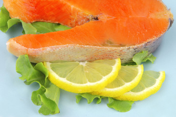salmon steak on blue dish