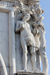 Eve statue on the façade of Ducal Palace in Venice, Italy