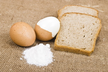 Eggs and slice bread on sackcloth material