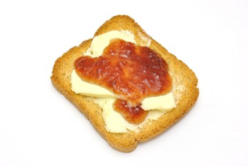 Fetta biscottata con burro e marmellata