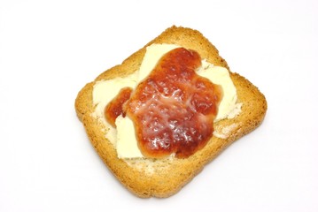 Fetta biscottata con burro e marmellata