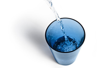 Pouring water in glass