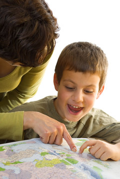 isolated boy and woman with map