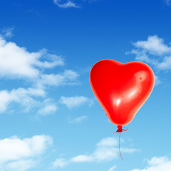Obraz na płótnie Canvas One Red Heart Detailed Balloon Isolated on White Background with