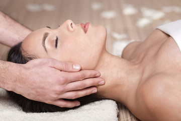 Fototapeta na wymiar Happy woman receiving head massage