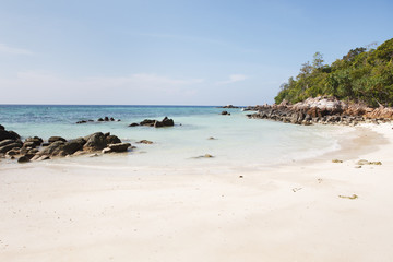 Fototapeta na wymiar Island lagoon with white sanded beach