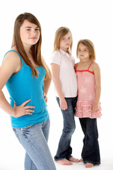 Group Of Girls Together In Studio Looking Unhappy