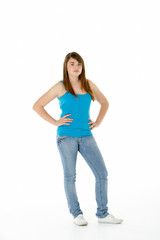 Obraz premium Studio Portrait Of Happy Teenage Girl