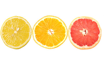 slices of three cintus fruits lemon orange and grapefruit