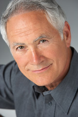 Studio Portrait Of Senior Man