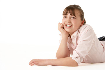 Young Girl Lying On Stomach In Studio