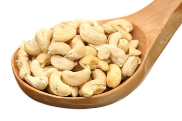 Cashew in a wooden spoon