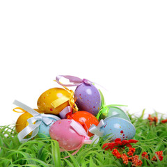 Easter Background - colorful Easter eggs on the grass.