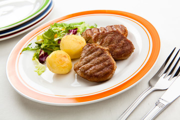 Grilled steaks and vegetables