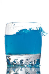Blue liquid in a low glass