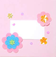 White blank card on pink paper background