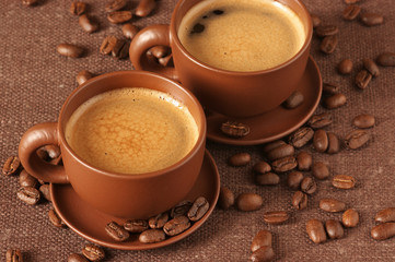 Cups of coffee and beans