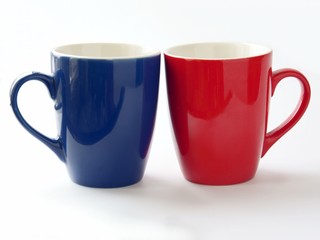 red and blue ceramic mugs