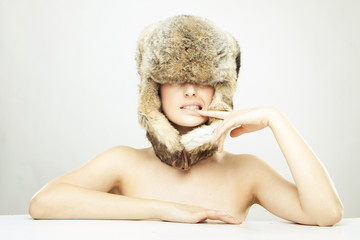 beautiful girl in a fur hat