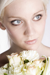 Beautiful woman with roses