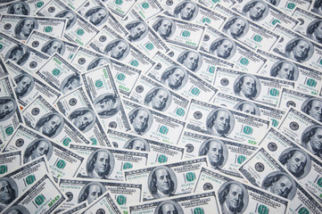 Stack of dollars on money background