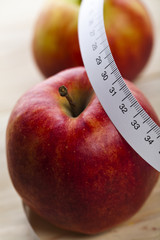 On diet - apple and tape measure