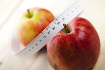 On diet - apple and tape measure