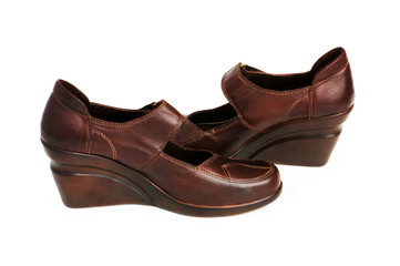 Brown boots isolated on the white background