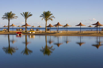 Beach on a sunny day. Hurghada city in Egypt.