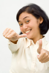 Asian business woman showing two thumbs up