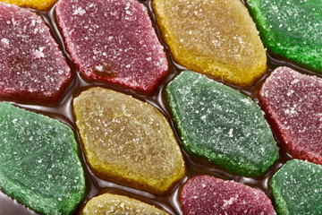 Laid on chocolate in the ranks of fruit jelly.