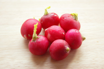 Radish on the wood desk
