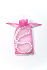 small pink bag with pearl