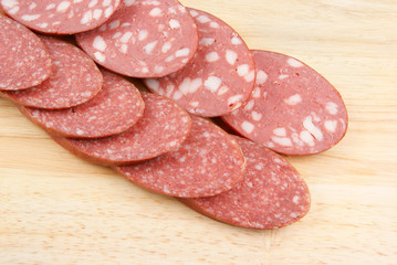 Sausage on wooden background