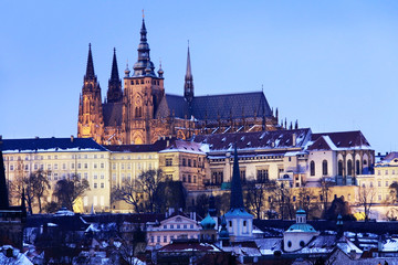 Snowy Prague gothic Castle with Charles Bridge in the Night