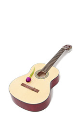Obraz premium a yellow acoustic guitar isolated on white