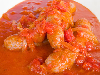Sausages in tomato sauce.